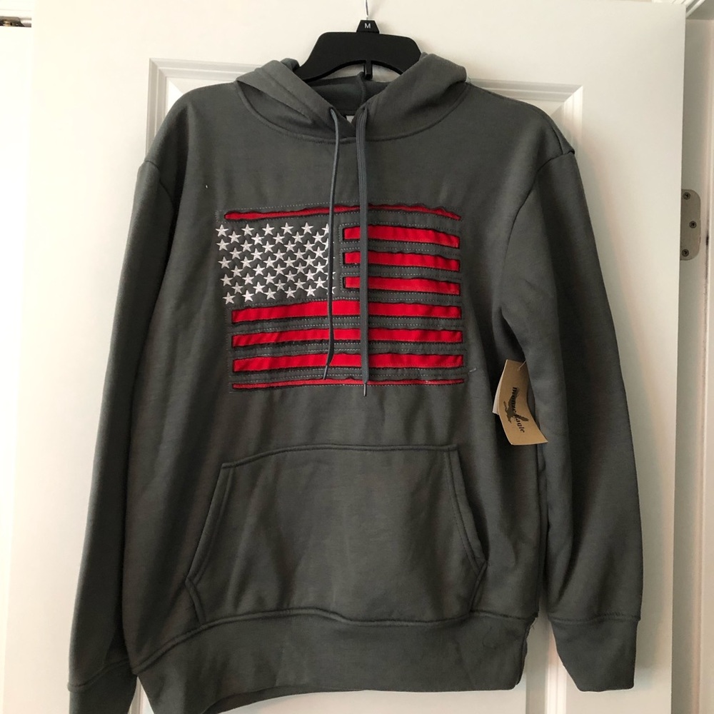 Gray hoodie with flag on front.